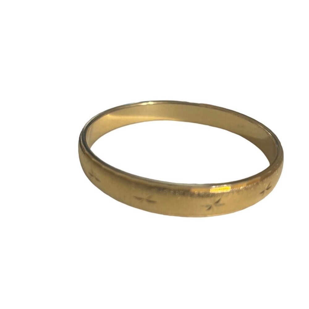 Monet Gold Tone Star Embossed Bangle Bracelet